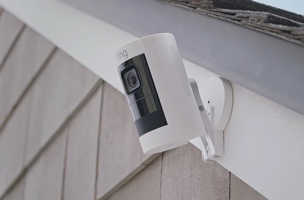 White Ring security camera mounted on house exterior for expert Ring camera installation services in Palm Beach Gardens, FL.